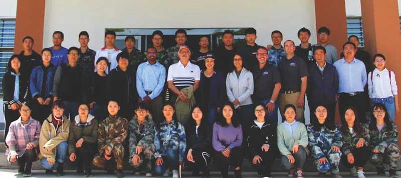 ACES Faculty and Dr. Rolando Flores, Dean ACES with CAU graduate students at Shiyanghe Experimental Station of China Agriculture University